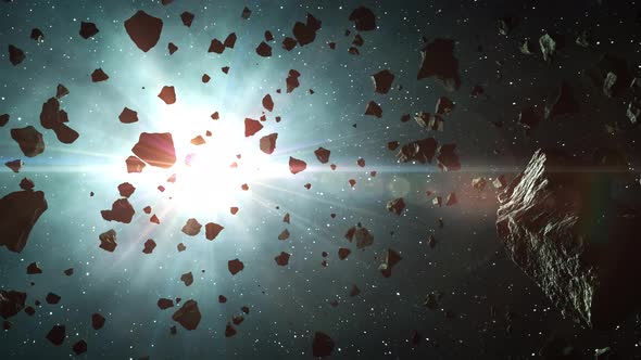 Asteroids Cluster In The Rays Of Blue Star alt