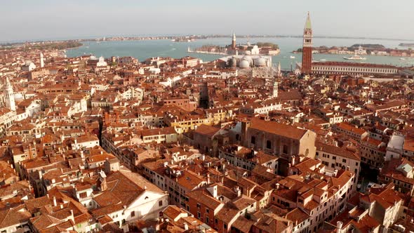 narrow canals and orange rooftops in Venice