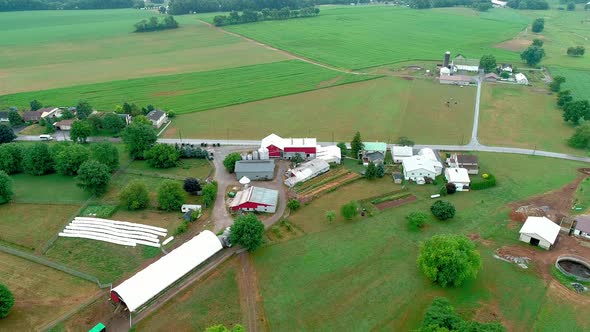 Amish Sunday Meeting in Countryside and Farmlands as Seen by Drone