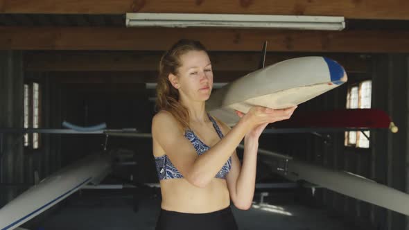 Female rowing team training on a river