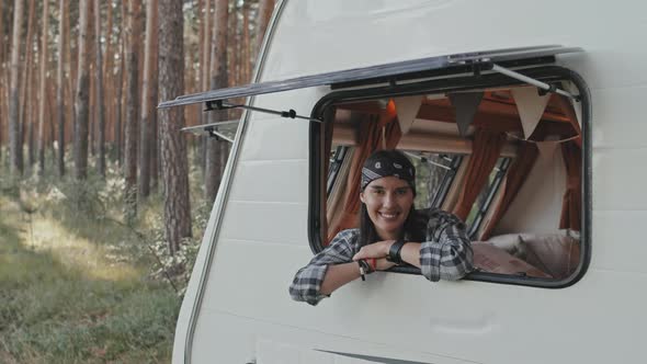 Portrait of Woman in Camper in Forest