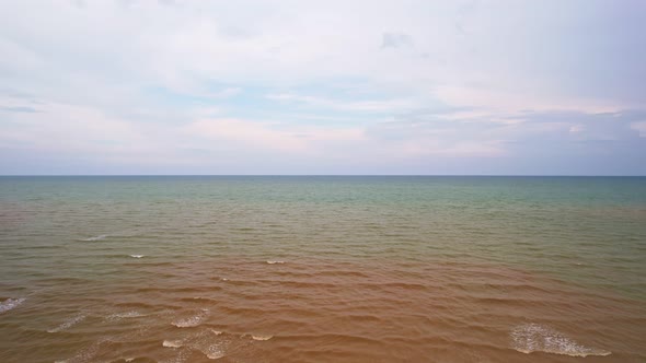 Drone view of ocean and sky background landscape. Sea water blue sky sea waves