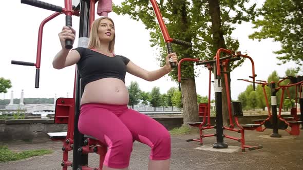 Pregnant woman doing sports, fitness for pregnant women