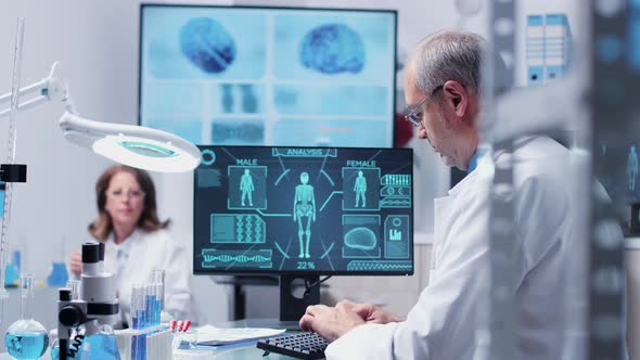 In Modern High End Laboratory Two Colleagues Are Talking About Samples alt