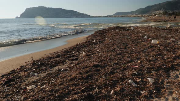 Polluted beaches with plastic waste garbage and trash.