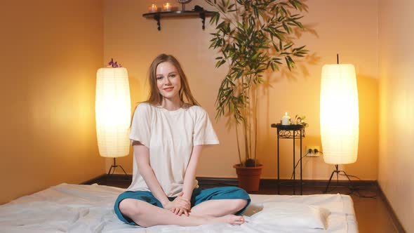 Beautiful Young Girl Posing for Camera in Spa Salon