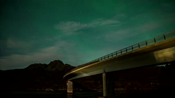 Northern lights above bridge in Norway