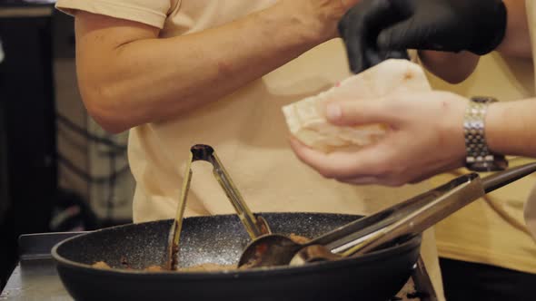 Mexican Tacos Shells with Beef Meat on Street Food Festival Onion Chef Cooking on Grill Traditional