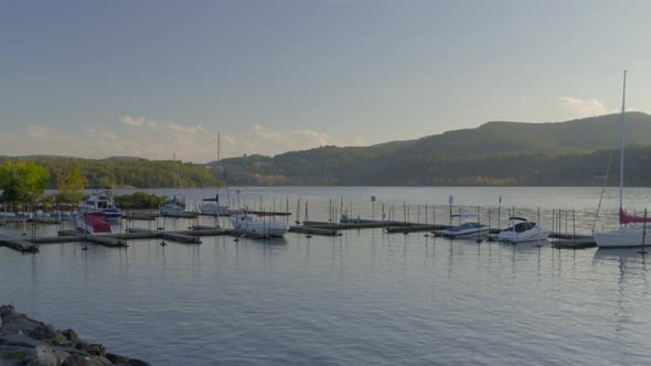 Boats moored at harbor on cost of Hudson River