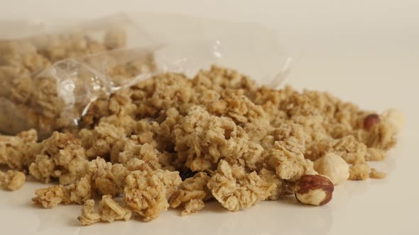 Shallow DOF healthy muesli with  hazelnuts 4K 2160p 30fps UltraHD tilting footage - Dehydrated  crun