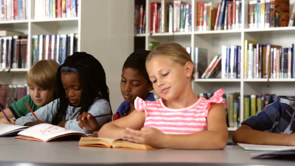 School kids studying in library