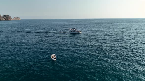 People dancing on a yacht aerial view 4 K