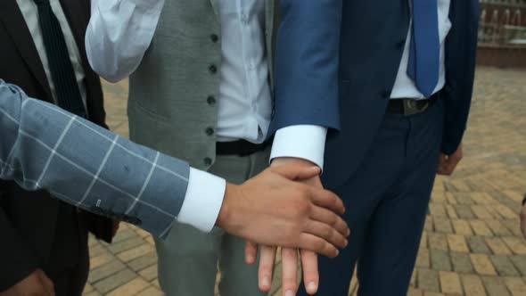 Close up  group of people stack hands put palms together. support, trust and team building concept.