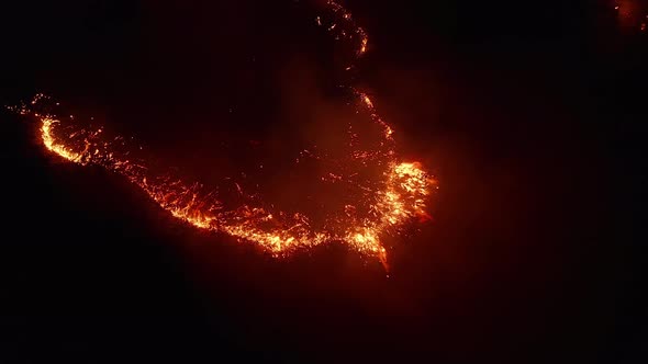 Aerial View. Dangerous Fire in the Field. Night Fire, Natural Disaster.