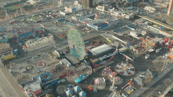Aerial Descending Drone Shot of Coney Island Ferris Wheel and Amusement Park