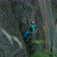 A Young Woman Descends From the Cliff on a Rope - VideoHive Item for Sale