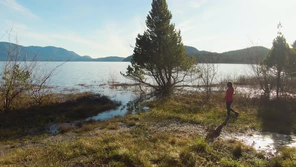 Adventure Girl Enjoying the Beautiful Lake in the Canadian Nature