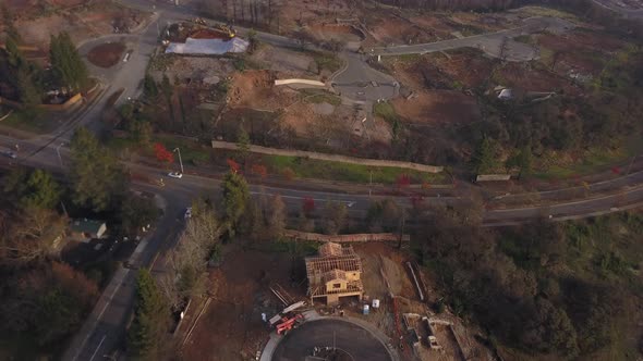 Drone fly over of burnt out neighborhood rebuilding after California wildfires