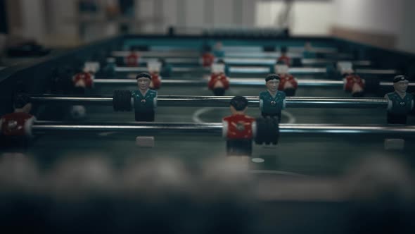 Miniature Foosball Players Figures on Table Close Up