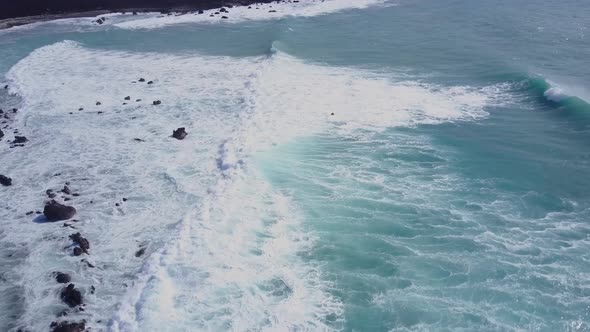 Flying Over The Rugged Coastline Of Hawaii