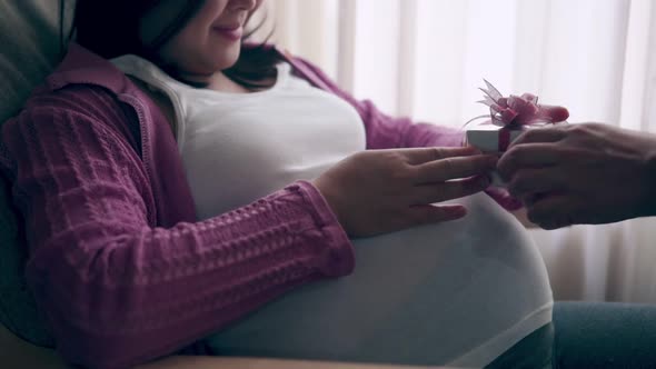 Pregnant Couple Feels Love and Relax at Home