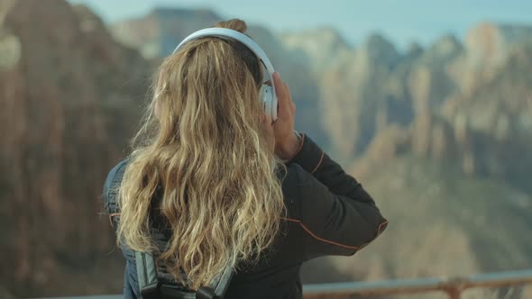 Girl Listens To The Music