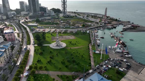 Aerial view of Chacha tower with big clock and cityscape of Batumi city