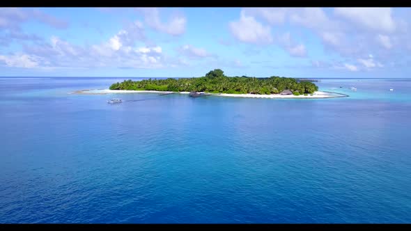 Aerial top down tourism of tropical coast beach lifestyle by blue water and white sandy background o