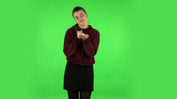 Woman with Pleasure Eating Sweet White Marshmallow While Enjoying. Green Screen