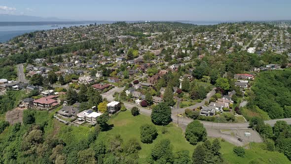 Helicopter Aerial View On Sunny Day In Magnolia Neighborhood Of Seattle Washington