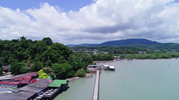 Drone aerial view of small bridge into the sea in Phuket Thailand