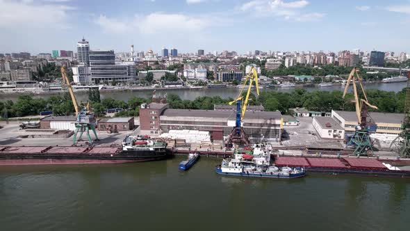 Cranes and Ships in a Dock