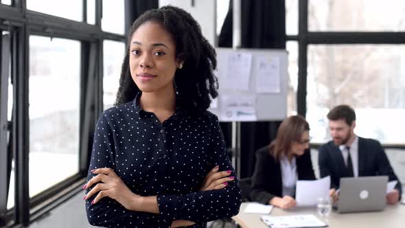 Portrait of Lovely Elegant Young Business Woman at the Briefing Meeting