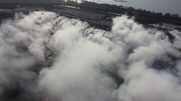 Air pollution fumes release during burning of landfill