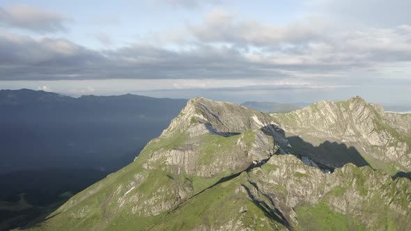 Approach to Natural Mountain Peak Cliff Terrain at Sun Light