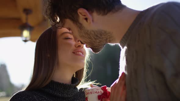 Couple kissing in the sunlight