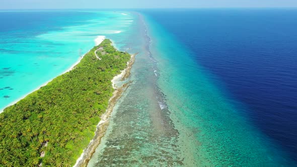 Aerial drone panorama of relaxing seashore beach holiday by transparent lagoon and white sand backgr