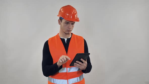 Handsome Builder Posing in Studio