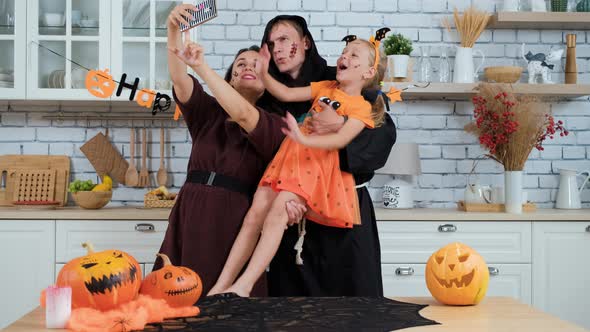 Funny Family Taking Photos on Halloween Party