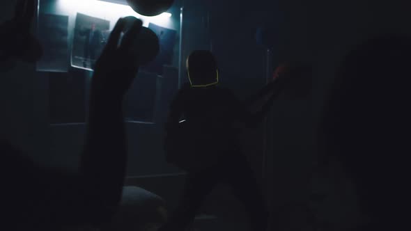 Teenager Playing Guitar for Family