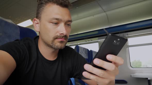 Attractive Man on Train