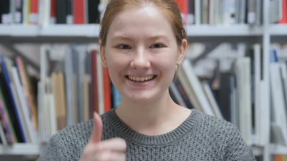 Thumbs Up by Young Female, Positive gesture at Home