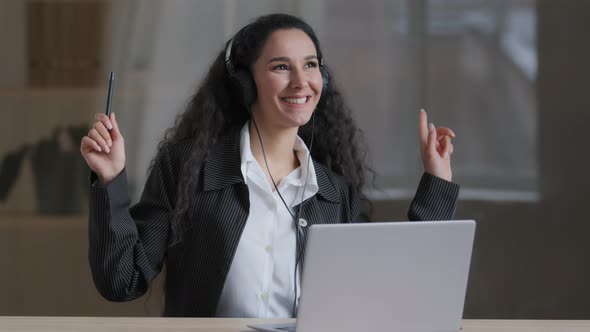Happy Young Arabian Girl Woman Carefree Student Worker Wear Headphones Listen Music Dance Energetic