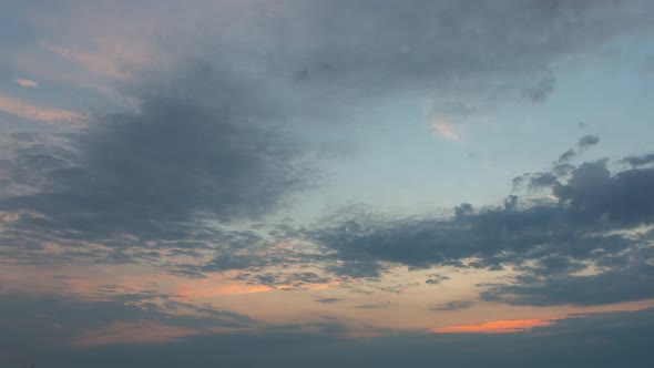 Clouds On Orange Sky During Summer Morning Sunrise, Time Lapse