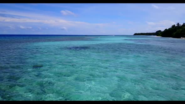 Aerial seascape of luxury shore beach voyage by turquoise sea with white sand background of a dayout