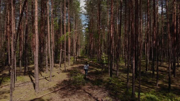 Happy Woman Runs Through Forest