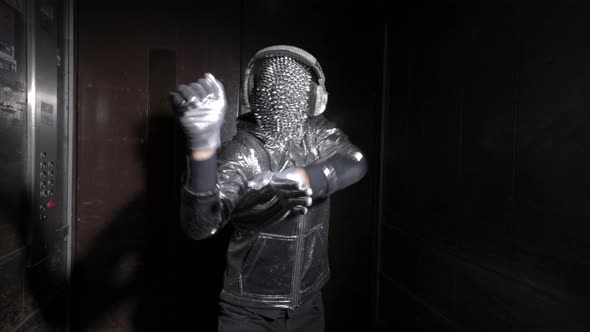 Sparkle Masked Man Dancing in a Lift / Videohive