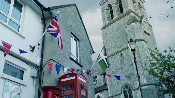 Typical English Town Detail With Flags Blowing