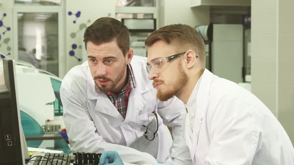 Attentive Laboratory Assistants Discuss the Results of Tests That They See on the Computer