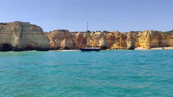 2 Mast yacht sailing along the rocky needle coast of Portugal